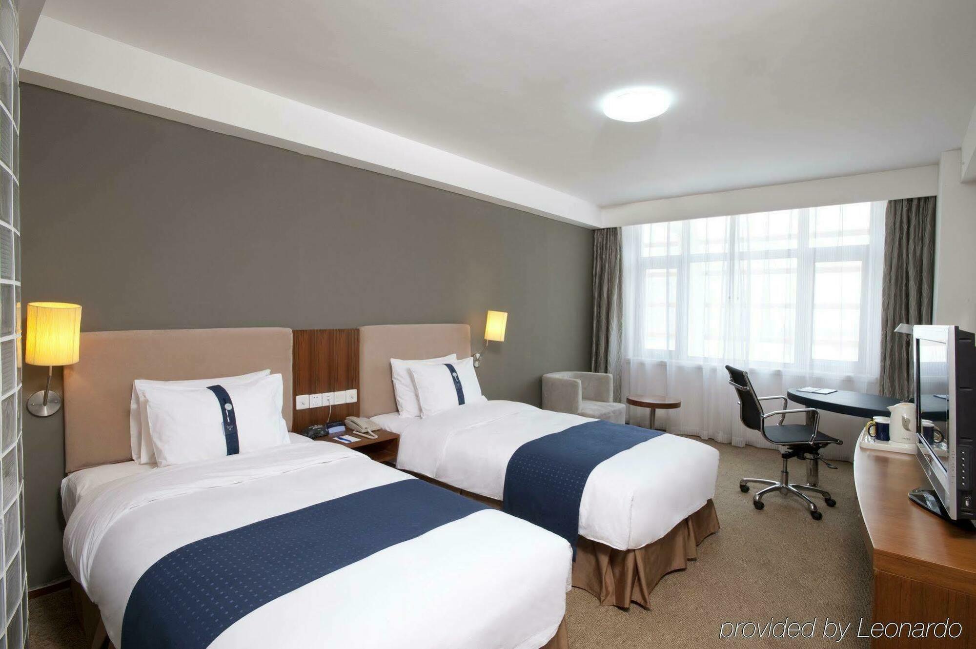 Holiday Inn Express Tianjin Binhai Номер фото